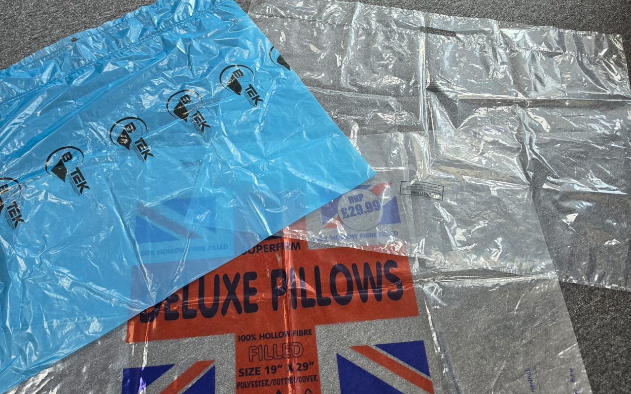 Printed clear and blue polythene pillow bags manufactured for retail pillow packing